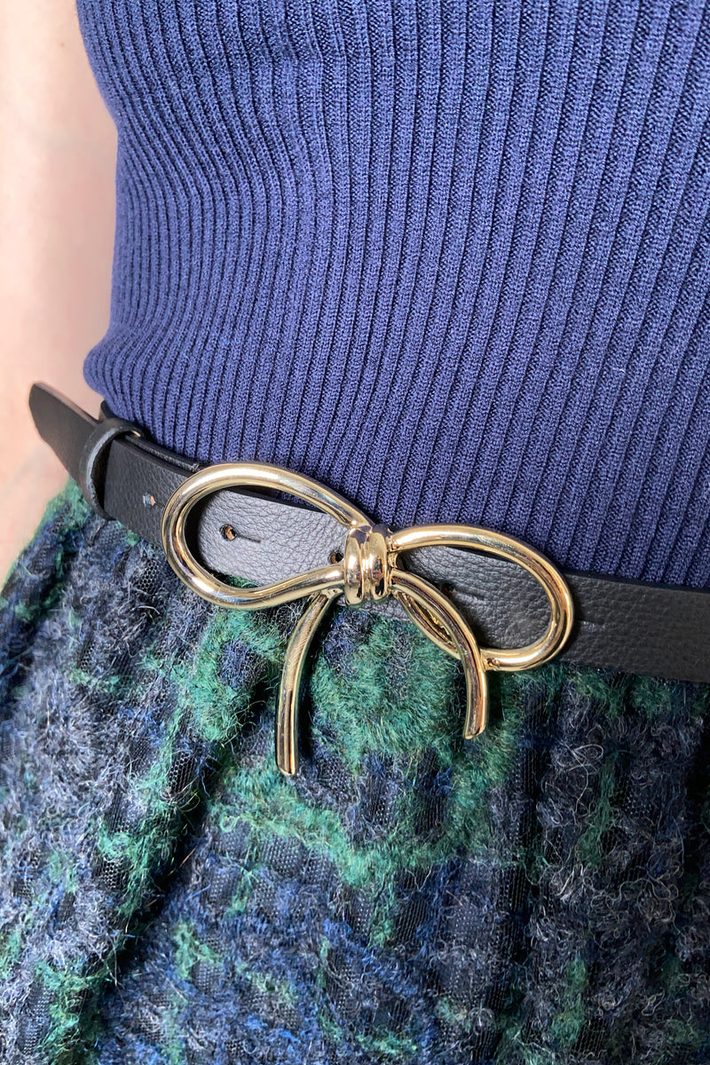 D. Exterior Black Leather Belt with Metal Bow Buckle