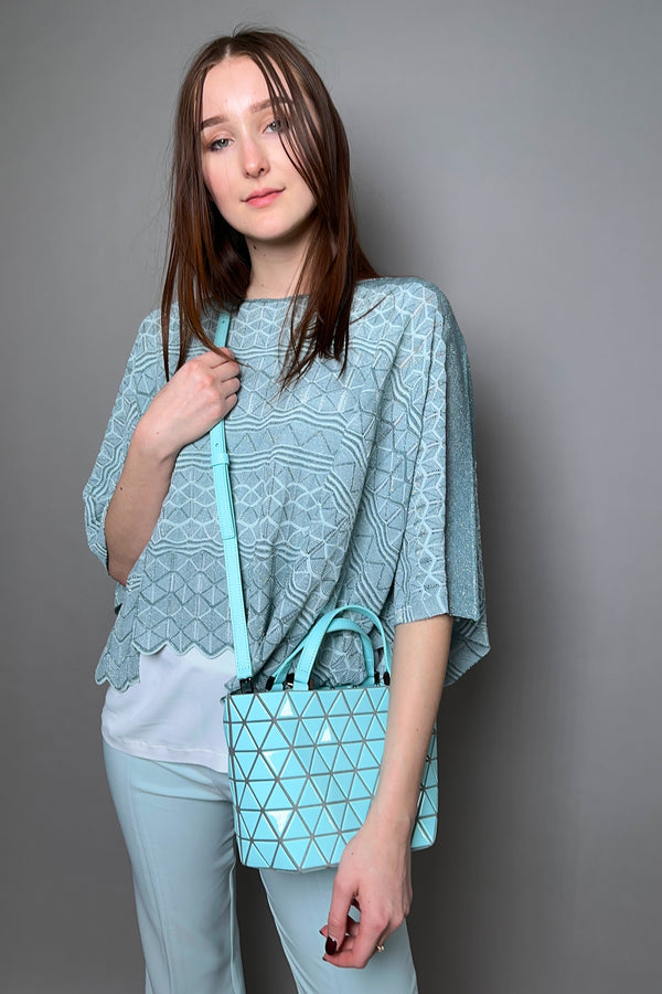 D. Exterior Sleeveless Knit Sparkle Poncho in Aqua