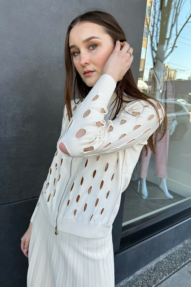 D. Exterior Cut Out Cardigan in Cream