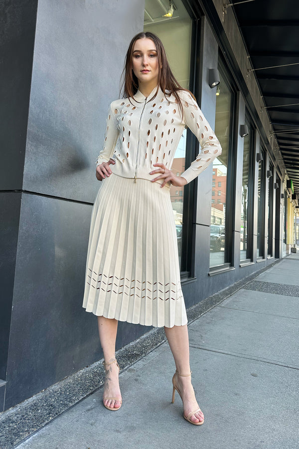 D. Exterior Pleated Knit Skirt with Cut Out Detail in Cream